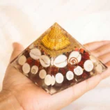 Shree Lakshmi orgone pyramid with Shree Yantra and Gomti Chakra for prosperity
