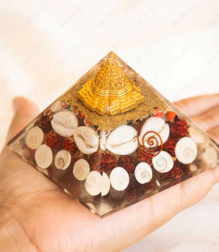Shree Lakshmi orgone pyramid with Shree Yantra and Gomti Chakra for prosperity