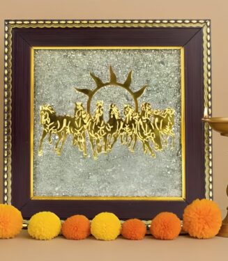 7 horses on raw pyrite frame wall decor with golden horse design, sun motif, brass diya lamp, and festive marigold flowers.
